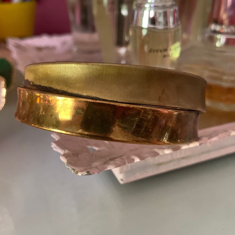 Large rose gold bangle bracelet over sterling silver